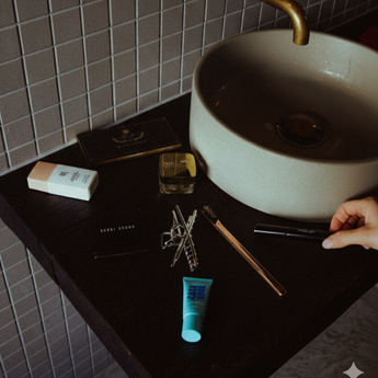 Cosmetic items including Casa Noon on a bathroom counter with a sink in the background